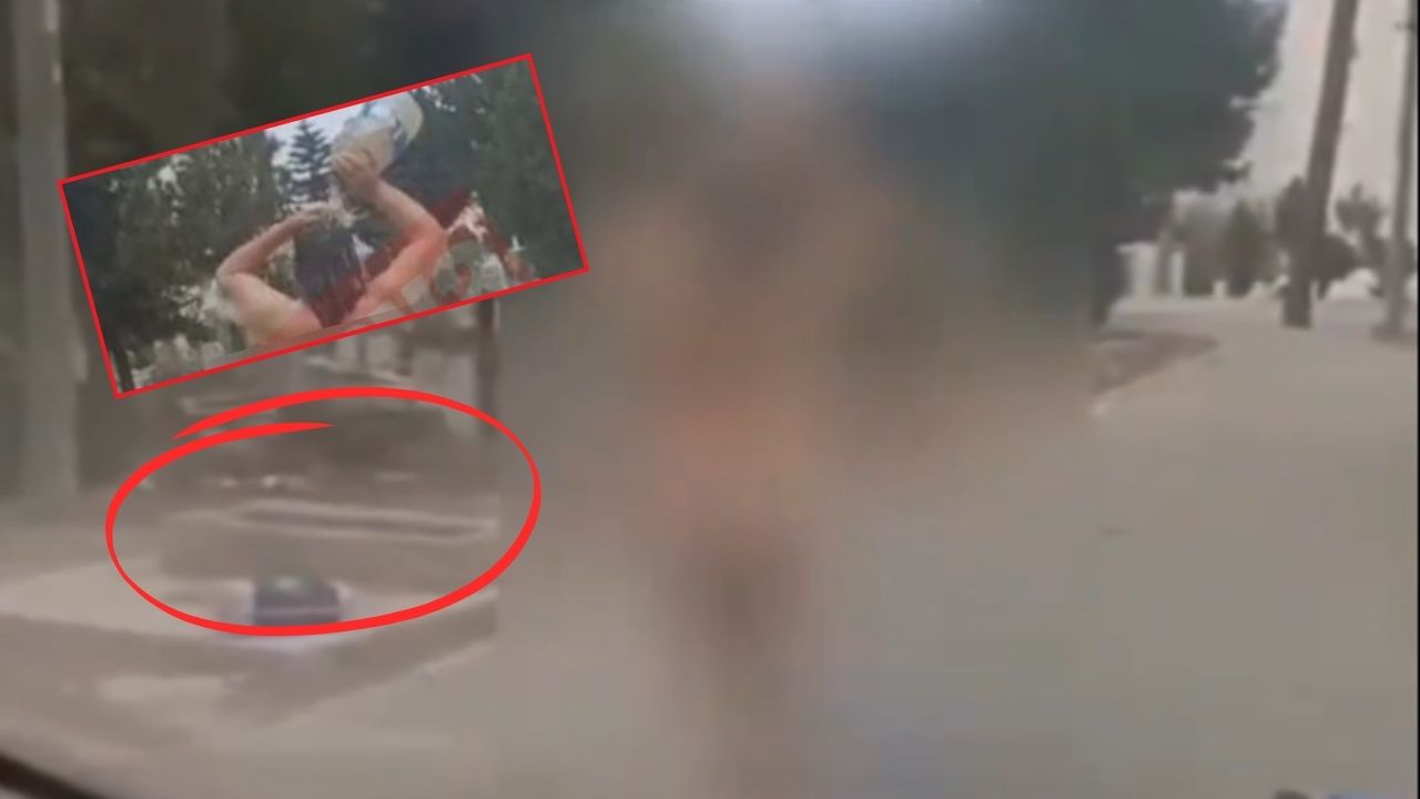 Mezarlıkta duş alan Rus kadın video izleyenleri şaşırttı